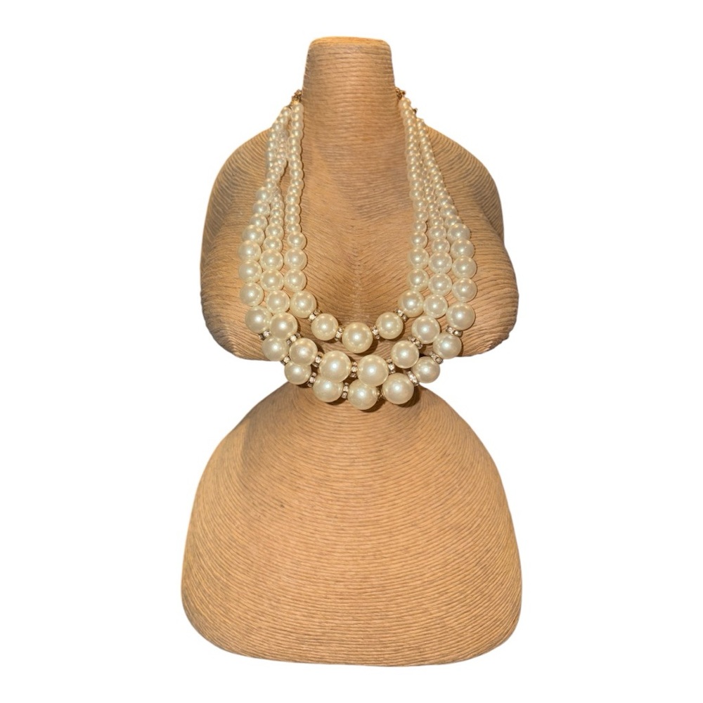 Triple strand vintage faux pearls w/some rhinestone spacers. GUC JB1